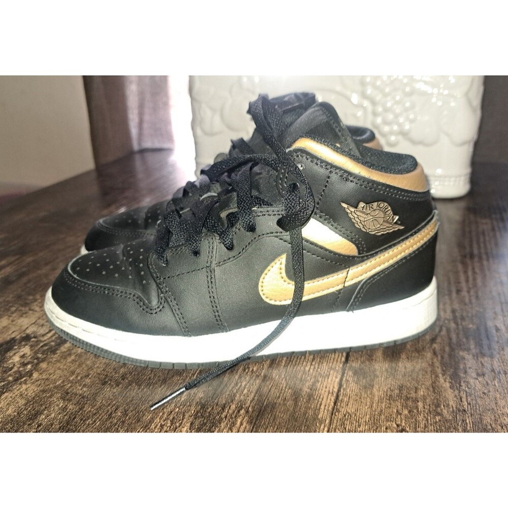 Black and Gold Jordans size 4